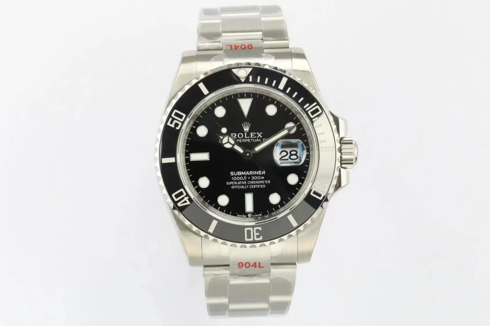 Product photograph 1 of 3: steel dive watch with a black dial, a black 60-minute bezel and a date window under a magnifying lens