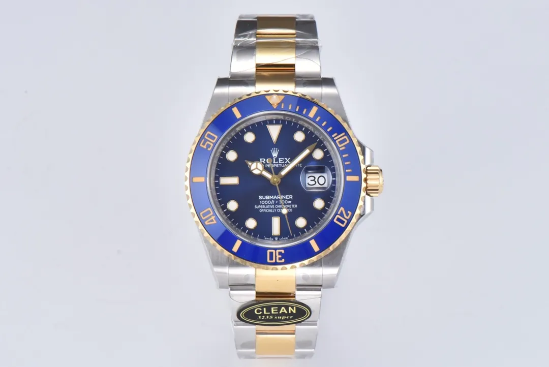 Product photograph 1 of 3: front view of a two-tone dive watch with a blue dial, blue sixty-minute bezel and three-link bracelet